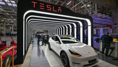 Teslas electric vehicles profit price cuts