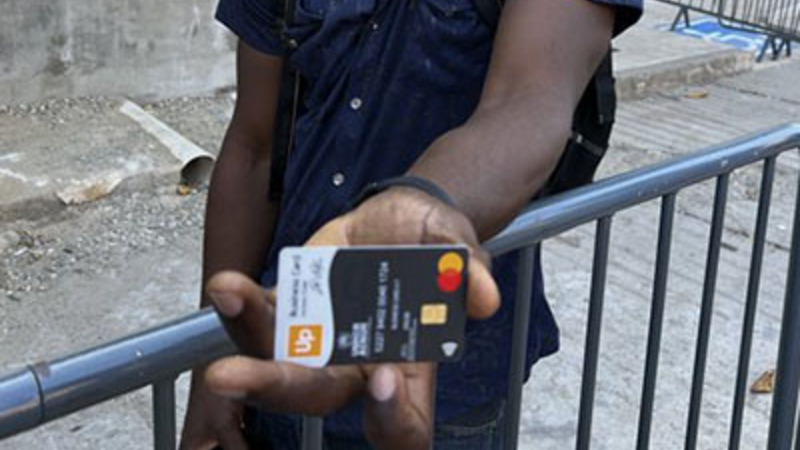 Migrants debit cards adams