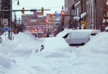 Snowstorm people blanketed snowiest already